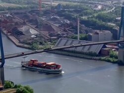 AERIAL WS ZI Ship passing on below bridge / Hamburg, Hamburg, Germany Stock Footage