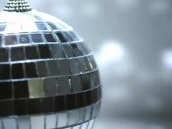 spinning mirror ball reflected light white walls Stock Footage