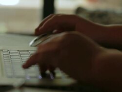 Boy on a computer Stock Footage