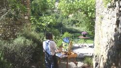Woman painting with watercolours en plein air. Stock Footage