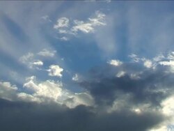 SUN RAYS THROUGH CLOUDS Stock Footage