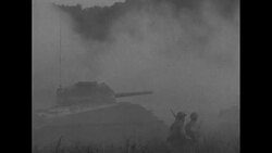 Soldiers and Sherman tanks firing on proving ground in Fort Knox; soldiers run and climb into tanks News Clip