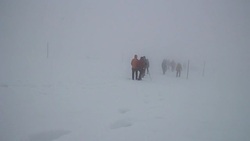 Hiking in winter blizzard Stock Footage