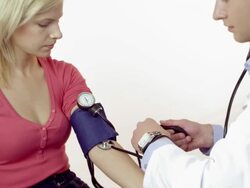 Checking blood pressure Stock Footage