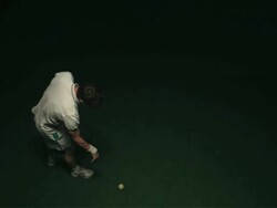 SLO MO WS HA Studio shot of man serving tennis ball Stock Footage