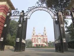 WS Men and women entering gates at religious enter in town / Delhi, India Stock Footage