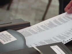 ECU, Person inserting voting ballot into ballot box, St. Marys, Ohio, USA Stock Footage