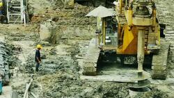 Construction workers at a building site Stock Footage