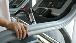 sport women running on treadmill cardio equipment Stock Footage