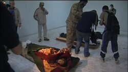 Queues as Libyans try to catch glimpse of body GRAPHIC Instructional Video