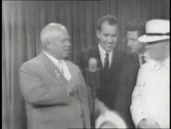 Premier Nikita Khrushchev talks to Vice President Richard Nixon at a meeting. News Clip