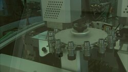 An automated machine makes watches at a watchmaking factory in Switzerland. Stock Footage