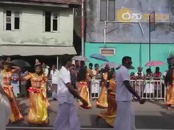 MS PAN Women in colourful traditional costumes parade in Buddhist Perahera Festival in Hikkaduwa AUDIO / Hikkaduwa, Southern Province, Sri Lanka Stock Footage