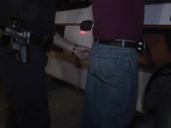 April 3 2009 MS Mexican police officers arresting people on street, Juarez, Chihuahua, Mexico, AUDIO Stock Footage