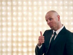 Man in front of lightwall Stock Footage