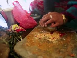 CU Woman preparing her lunch / Durma, Banke District, Nepal Stock Footage