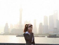 Business woman standing at riverside  Stock Footage