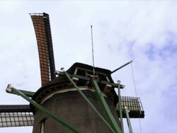 Dolly shot of historical windmill Stock Footage