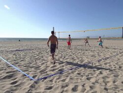 Men playing beach volleyball. - Slow Motion - filmed at 240 fps Stock Footage