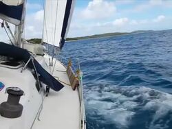 HD: Sailing in the wind with sailboat Stock Footage