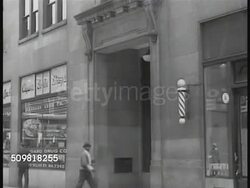 1944: ATLANTA: WS Atlanta, downtown street. EXT Standard building. INT glass door 'Southern Regional Council, Inc.' INT People seated at table. Dr. Reed & Dr. Johnson at table. Pamphlet cover 'Needed...A Southern Charter for Race /Relations' Instructional Video