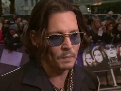 INTERVIEW: Johnny Depp on working with Tim Burton again, enjoying working with him, what audiences can expect at Dark Shadows: European Premiere at Empire Leicester Square on May 9, 2012 in London, England. Stock Footage