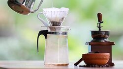 Drip coffee Process. Pouring a boiling water over the grounds. Stock Footage