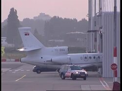 WRAP Karadzic arrives at airport ADDS prison shots News Clip