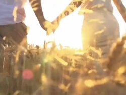 HD SUPER SLOW-MOTION: Couple Running In Wheat Field Stock Footage