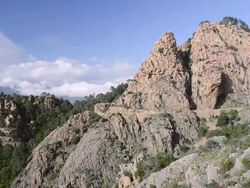 WS View over the fantastic rock landscape of the Calanche of Piana, UNESCO World Heritage Site / Gulf of Porto, Corsica, France Stock Footage