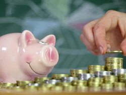 success in business and piggy bank Stock Footage