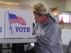MS Shot of young white middle class woman votes provisional ballot in presidnetial election at UAW hall / Toledo, Ohio, United States Stock Footage