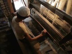 MS HA Man weaving on loom / India Stock Footage