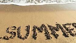 SUMMER written in water's edge Stock Footage