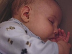 CU Shot of fanny baby boy sucks thumb / Beaverton, Oregon, United States  Stock Footage