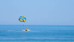 parasailing over the sea Stock Footage