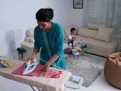 Woman Ironing clothes  Stock Footage