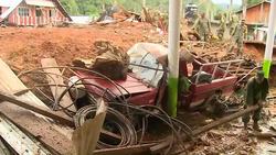 VOICED : Mexico alud arrasa con un pueblo News Clip