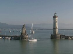 WS View of Lindau harbour entrance and lighthouse at Lake Constance / Lindau, Bavaria, Germany  Stock Footage