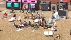 Aerials of Brighton beach in the sunshine News Clip