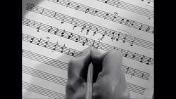 CU hand writing music notes / United States News Clip