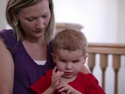 Close-up of blind child stetching and clapping Stock Footage