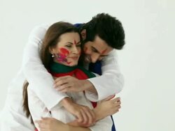 Couple playing holi with colors   Stock Footage