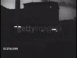 1950: VATICAN CITY: NIGHT: VS Piazza San Pietro (St. Peter's Square) w/ obelisk FG, fountain FG, street lamps w/ light in window of building BG. Instructional Video