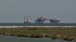 Offshore oil rigs off the coast of Louisiana. Stock Footage