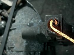 HD: Blacksmith Bending Wrought Iron Stock Footage