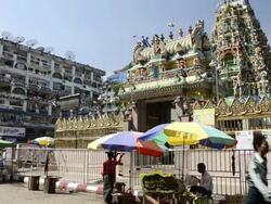 MS Local people in front of colorful Indian sri kali temple / Yangon, Yangon Division, Myanmar Stock Footage