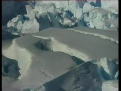 First aerials and grounds shots of massive iceberg Instructional Video