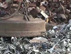 CU ZO PAN POV Magnet lifting steel scrap at scrapyard / Bous, Saarland, Germany Stock Footage