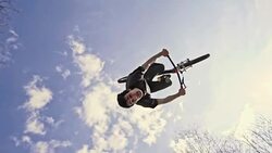 SLO MO MTB performing backflip trick Stock Footage